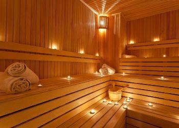 Multi-Tier Benches Inside Sauna with Lights and Towels